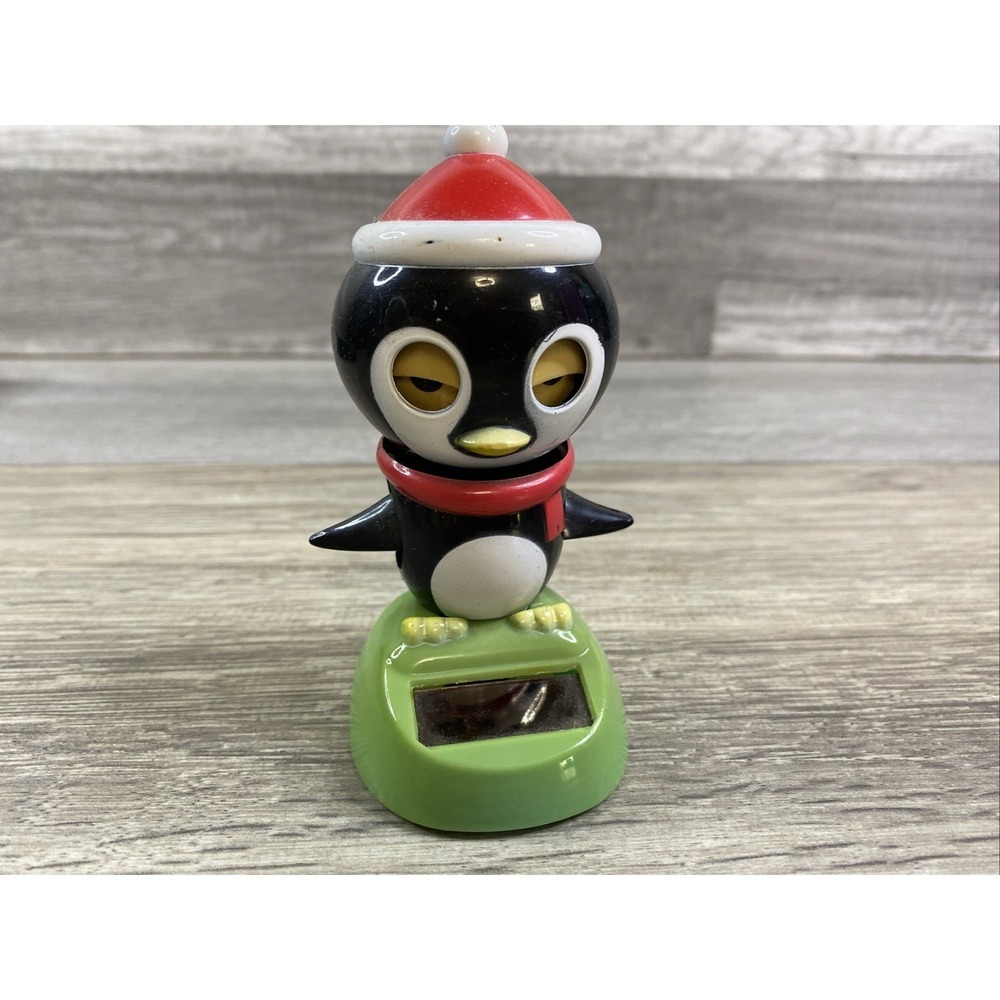 Solar Dancing - Eye Blinking Penguin - Greenbrier International